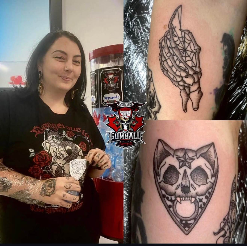 Tattoo artist with artwork