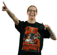 Model wearing black Ink Therapy graphic T-shirt featuring illustrated tattoo artwork in red and white