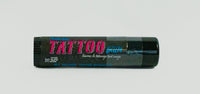 Tattoo balm container with black and pink text on a white background