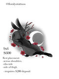 Black rabbit tattoo design with antlers, red eye, crescent moon, and scattered red flowers
